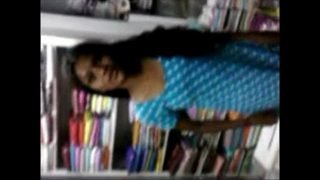 Indian young Student Relaxed on Inside Of book shop – Wowmoyback